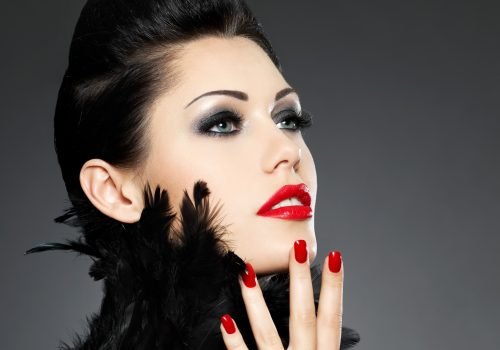 beautiful-fashion-woman-with-red-nails-creative-hairstyle-makeup